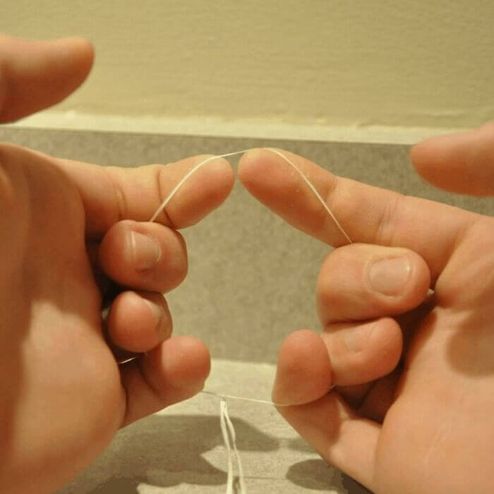 Tie dental floss ends together to floss easier