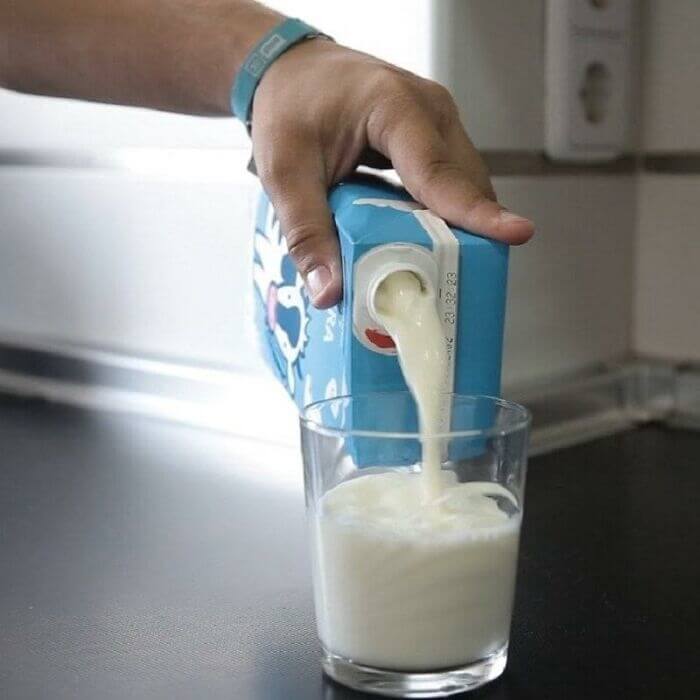 Pour milk with the opening to the top when using long-life milk cartons to avoid spilling.